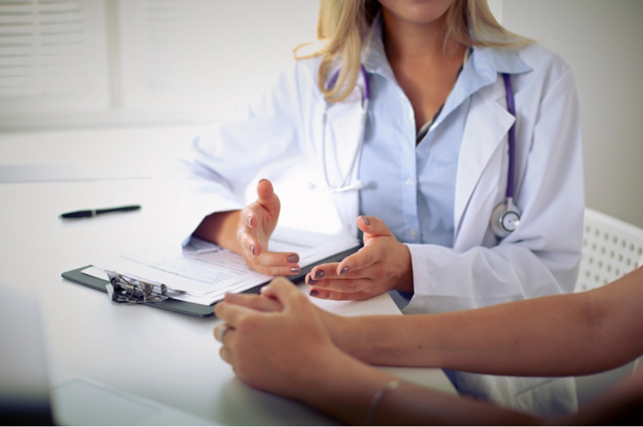 Doctor interacting with patient via telehealth